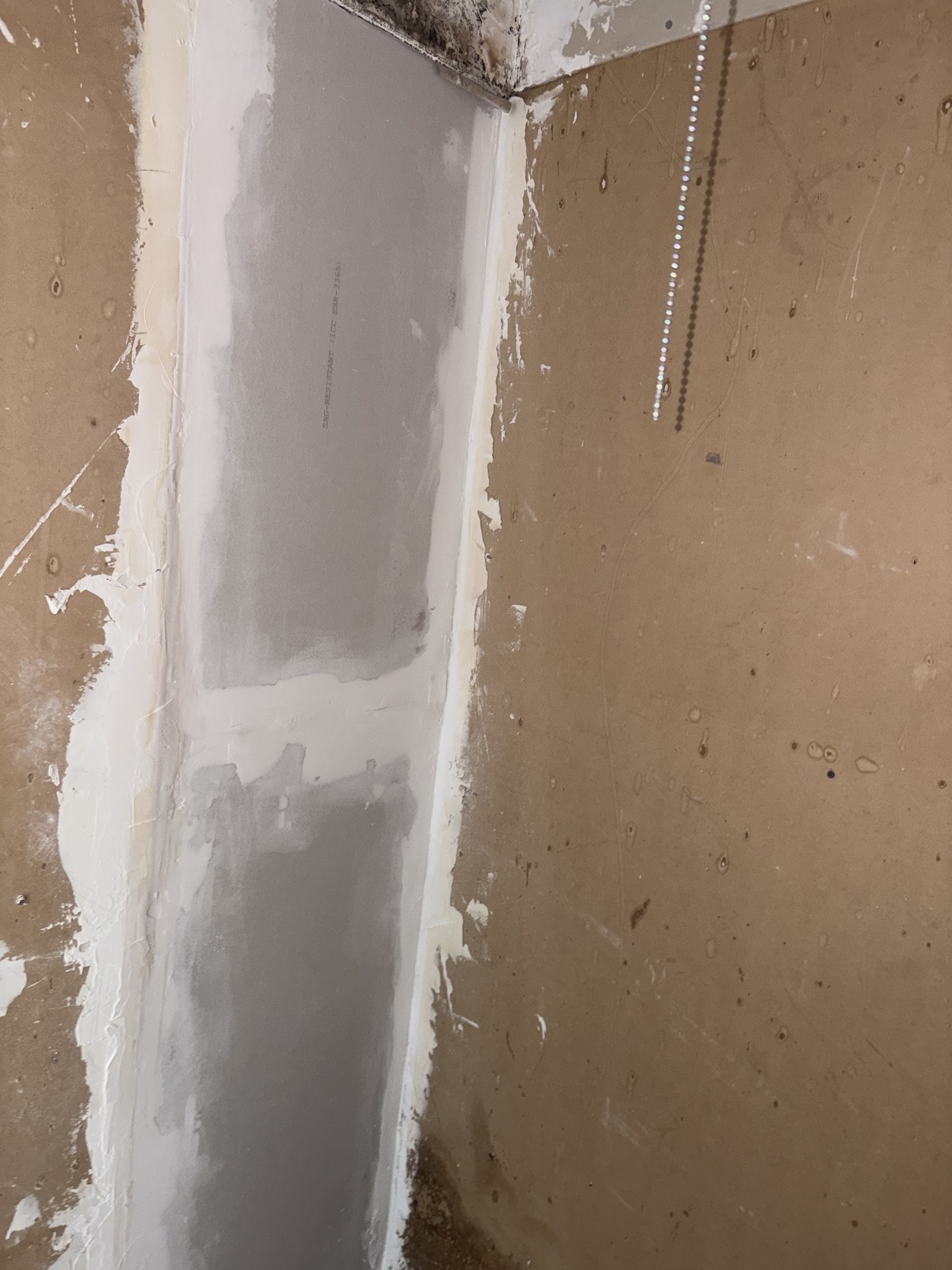 Close-up of drywall patching